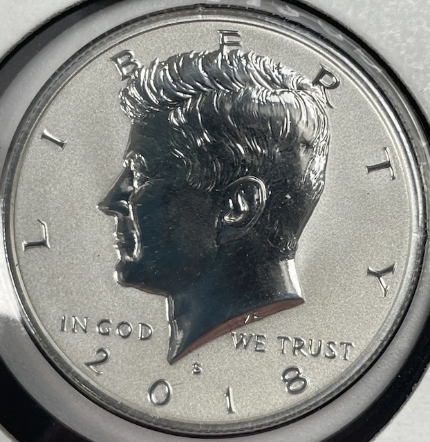 2018-S Kennedy half dollar clipped planchet error — showing the curved missing section of the coin's edge and interrupted rim